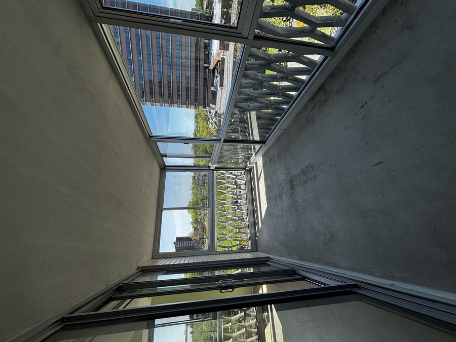 Glass railing with standoff hardware detail