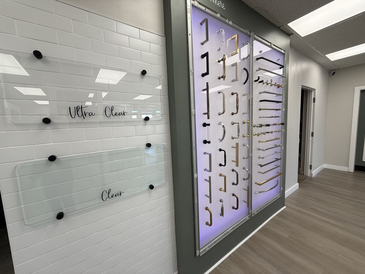 Glass texture and hardware finish selection wall in the showroom