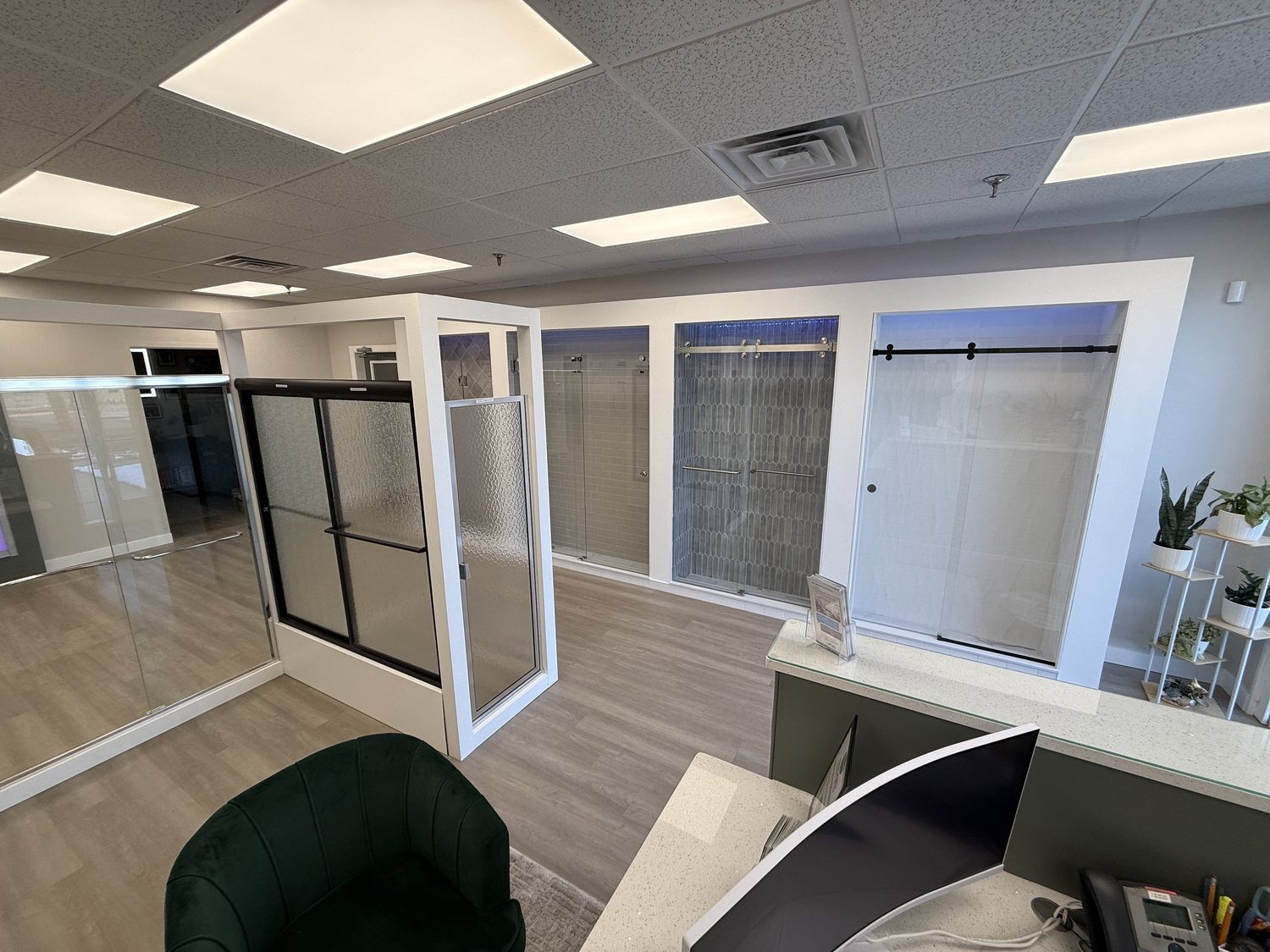 Showroom floor with glass enclosure displays