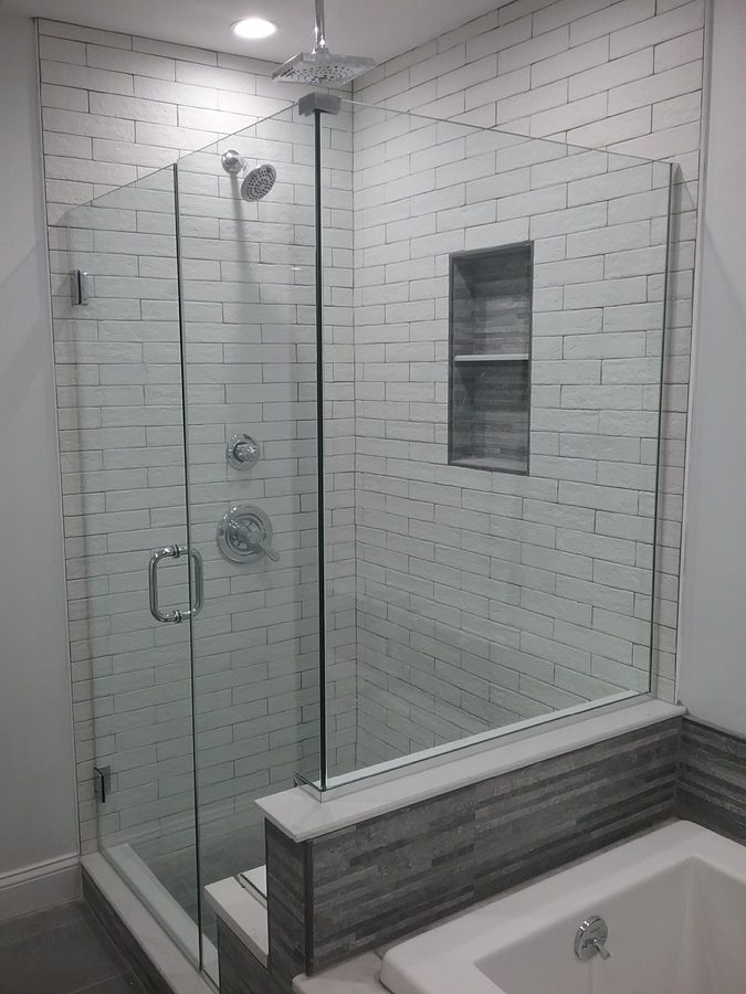 Low-iron frameless shower enclosure in a Northern Valley estate