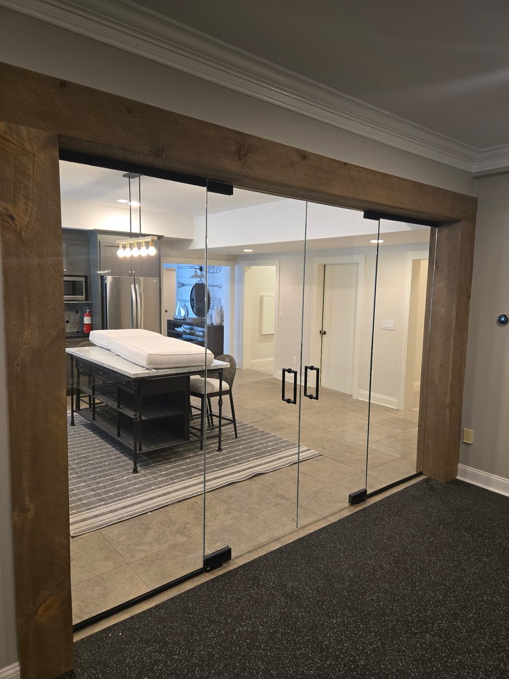 Black grid-framed glass enclosure